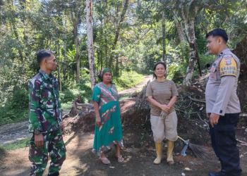 Bhabinkamtibmas Polsek VII Koto Sungai Sarik Dan Babinsa. (Foto : Agustin).