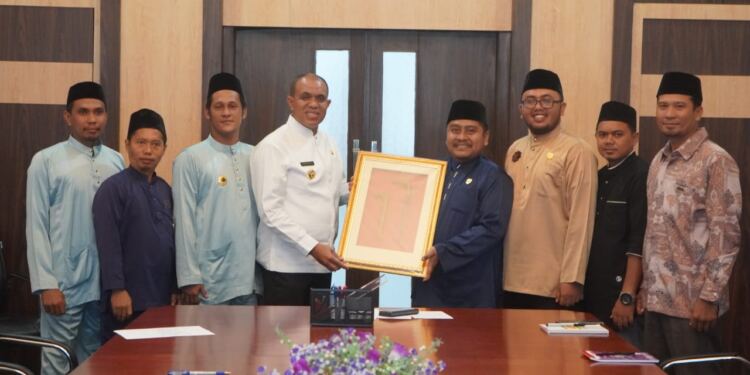 Pj Bupati Langkat H.M.Faisal Hasrimy AP,M.AP . (Foto/Diskominfo)).
