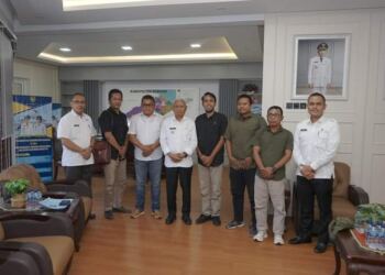 Bupati Asahan H. Surya, BSc menerima audiensi Serikat Media Siber Indonesia (SMSI) Kabupaten Asahan. (foto/sabungan)