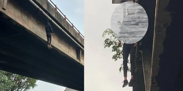 Seorang pria tergantung di flyover Cimindi, Bandung. (foto/net)
