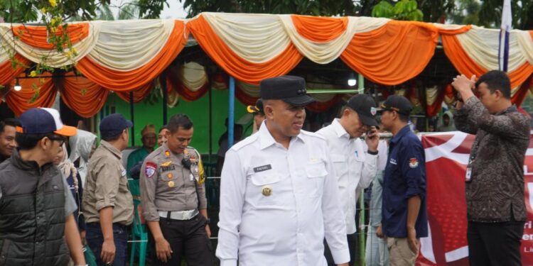 PJ Bupati Langkat dan Kapolres Pantau TPS di Stabat: Pastikan Pemilu 2024 Berjalan Kondusif (foto/Diskominfo Langkat)