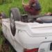 Mobil putih yang terguling ke sawah pada insiden ini. (foto/ist)