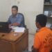 Pelaku yang ditahan oleh polisi (foto/doc)