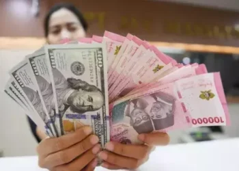 Dollar AS dan Rupiah. (foto/net)