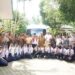 Bupati Langkat H. Syah Afandin, SH menyerahkan satu unit bus layanan sekolah gratis. (Foto/Kominfo).