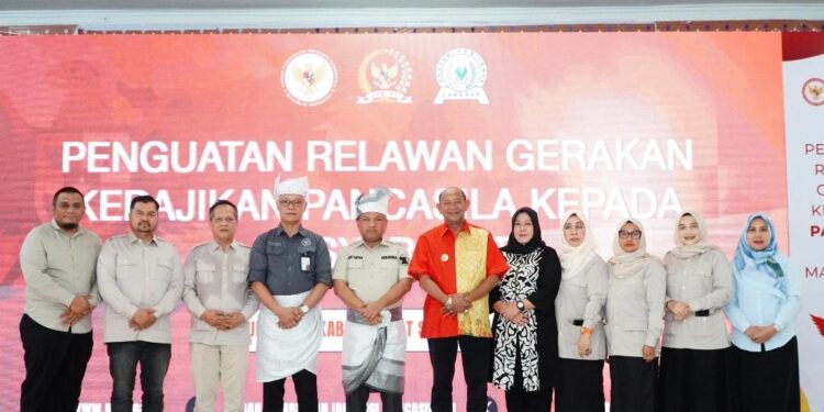 Bupati Langkat H. Syah Afandin, SH menghadiri seminar Penguatan Relawan Gerakan Kebajikan Pancasila. (Foto/Diskominfo).