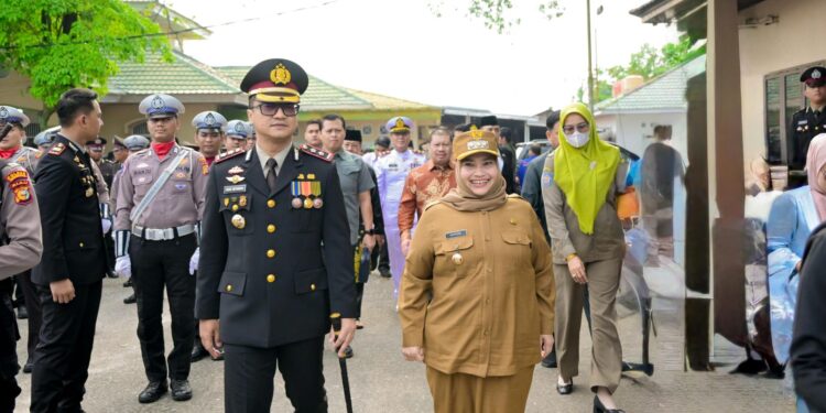 Bupati Bengkalis Kasmarni Hadiri HUT ke-79 Bhayangkara. (Foto/Darwis)