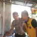 Polsek Bohorok Bagikan Nasi Kotak Untuk Warga Sekitar. (Foto/JR Siahaan)