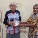 Kades Secanggang, T. Syaiful Anhar Serahkan Bantuan untuk Penyandang Disabilitas. (Foto/Doc)