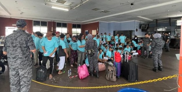 148 PMI Ilegal yang di Deportasi Pemerintah Malaysia Tiba di Batam. (Foto/Doc).