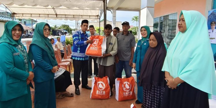 Kepala KUA Lingga Muhammad Amin Jadi Narasumber Zakat di Kegiatan PKK Kabupaten Lingga. (Foto/Handoyo).