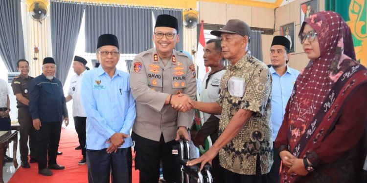 Kapolres Langkat Apresiasi Pendistribusian Bantuan Baznas untuk Masyarakat yang Membutuhkan. (Foto/Jhon).