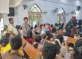 Polsek Tanjung Pura Perkuat Pelayanan Kamtibmas Dengan Intensifkan Pengamanan Ibadah Minggu Kasih. (Foto/Jhon).
