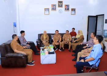 Tim Samsat Tulang Bawang Perkuat Koordinasi dan Berikan Doorprize kepada Wajib Pajak.(Foto/Masderik).