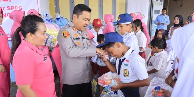 Kapolres Langkat Santuni Anak Yatim, Wujud Kepedulian Polri untuk Masyarakat. (Foto/Jhon).