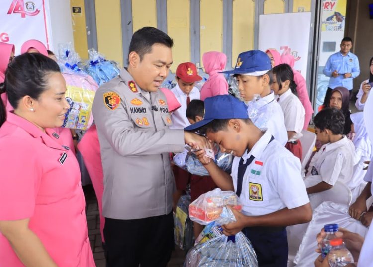 Kapolres Langkat Santuni Anak Yatim, Wujud Kepedulian Polri untuk Masyarakat. (Foto/Jhon).