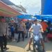 Polsek Salapian Intensifkan Patroli di Pasar Tanjung Langkat. (Foto/Jhon).