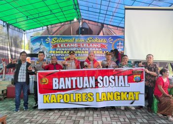Polres Langkat Salurkan 100 Sak Material untuk Pembangunan Gereja GBKP Runggun Titi Besi. (Foto/Jhon).