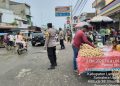 Polsek Salapian Intensifkan Patroli di Pasar Tanjung Langkat Cegah Gangguan Kamtibmas. (Foto/Jhon).